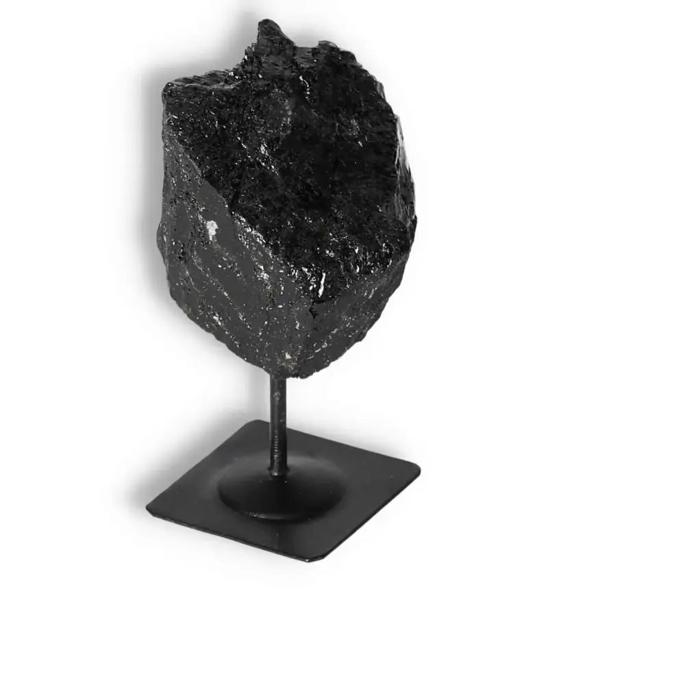 Rough Black Tourmaline on Metal Stand S from Sylvia Crystals, ideal for energy cleansing and grounding, handpicked for quality.