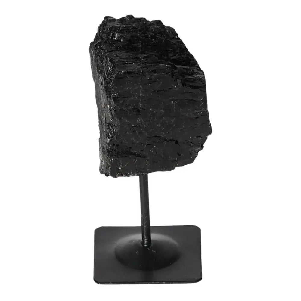 Rough Black Tourmaline on Metal Stand S by Sylvia Crystals, ideal for spiritual healing and energy cleansing.