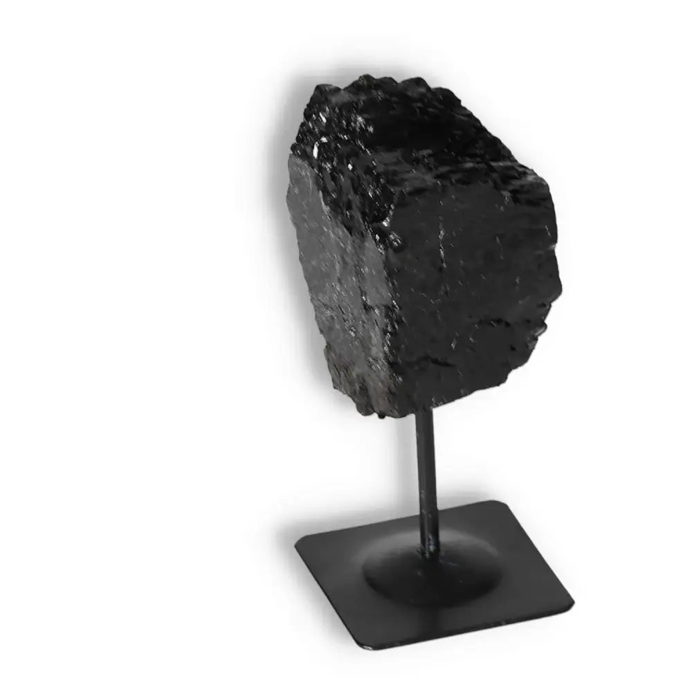 Rough Black Tourmaline on Metal Stand S by Sylvia Crystals, ideal for spiritual healing and energy cleansing.