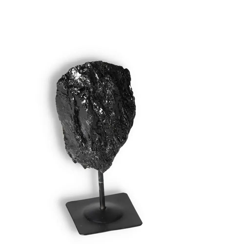 Rough Black Tourmaline with Metal Stand S by Sylvia Crystals, known for cleansing and grounding properties.