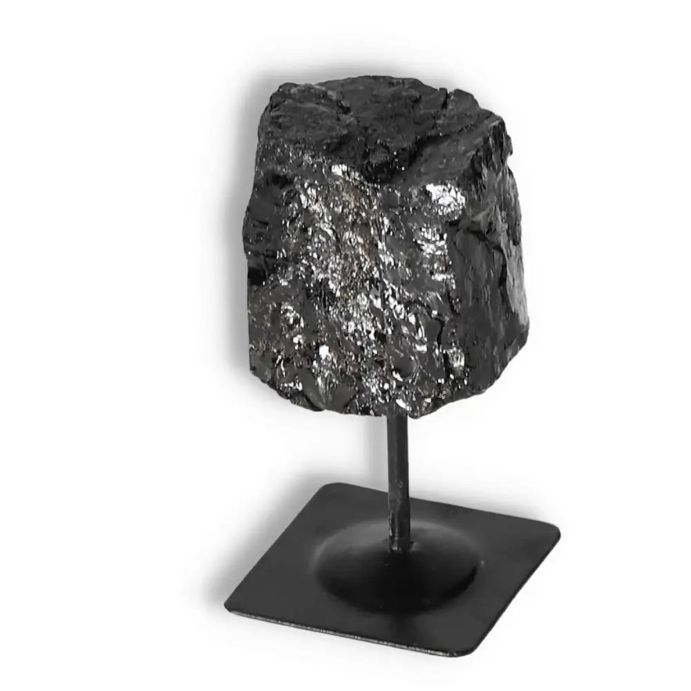 Rough Black Tourmaline on Metal Stand S from Sylvia Crystals, known for cleansing energy and emotional healing.