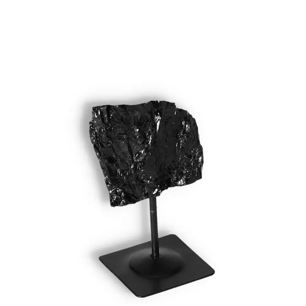Rough Black Tourmaline with Metal Stand S for powerful energy cleansing by Sylvia Crystals.