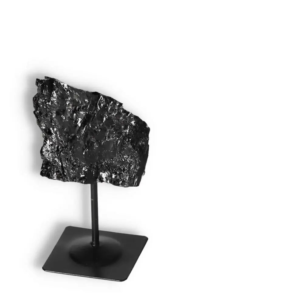 Exquisite Rough Black Tourmaline on Metal Stand for energy cleansing and focus-enhancement, Sylvia Crystals exclusive.