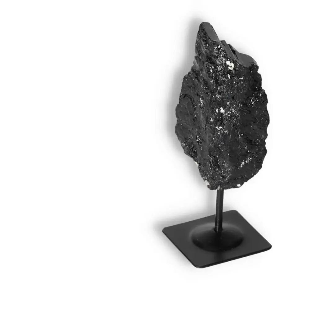 Rough Black Tourmaline with Metal Stand S by Sylvia Crystals. Premium crystal for energy cleansing and transformation.