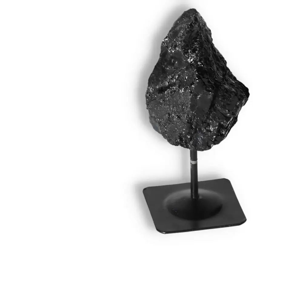 Rough Black Tourmaline with Metal Stand S from Sylvia Crystals, showcasing its natural texture and sleek display design.