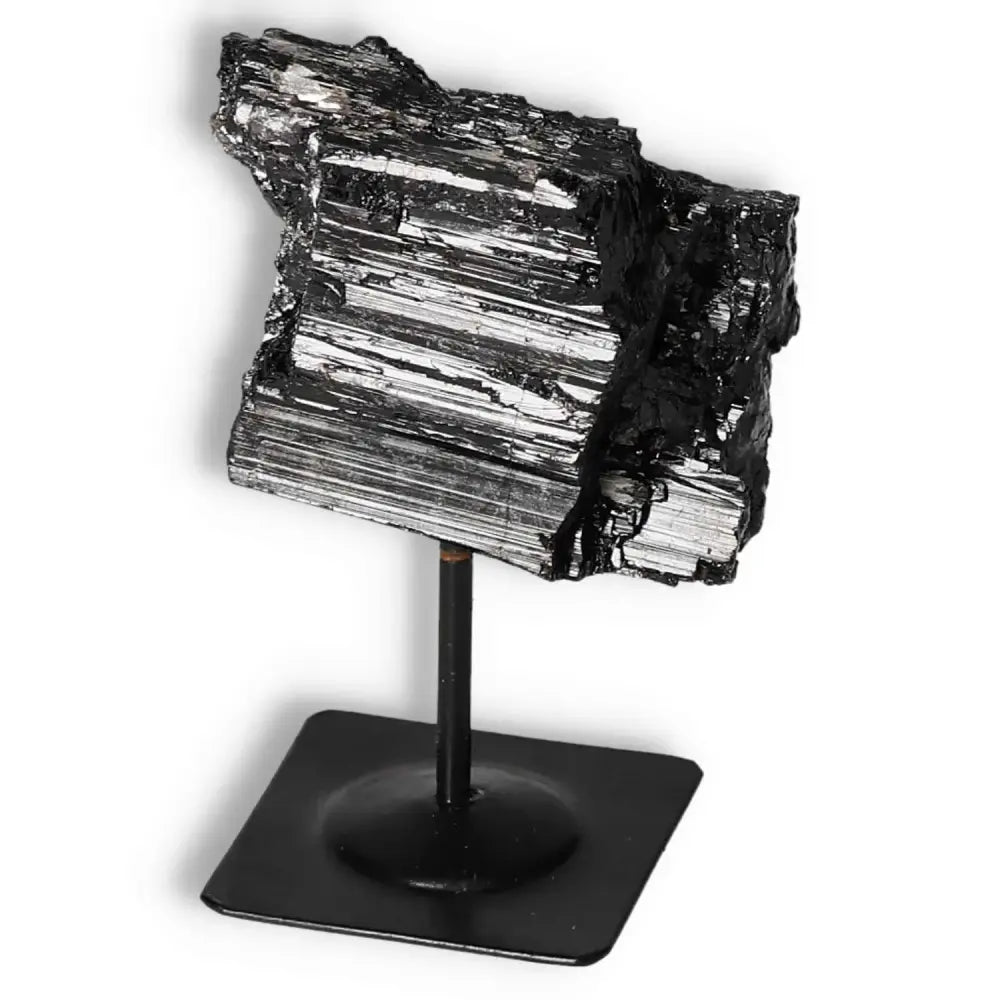 Rough Black Tourmaline on Metal Stand S from Sylvia Crystals, symbolizing luxury and spiritual well-being by cleansing energies.