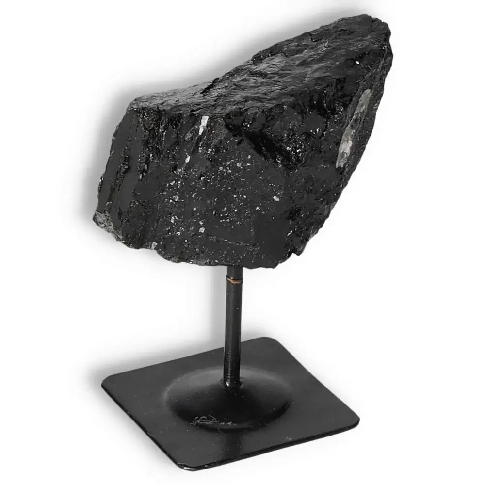 Rough Black Tourmaline with Metal Stand S by Sylvia Crystals, perfect for energy cleansing and mental balance.