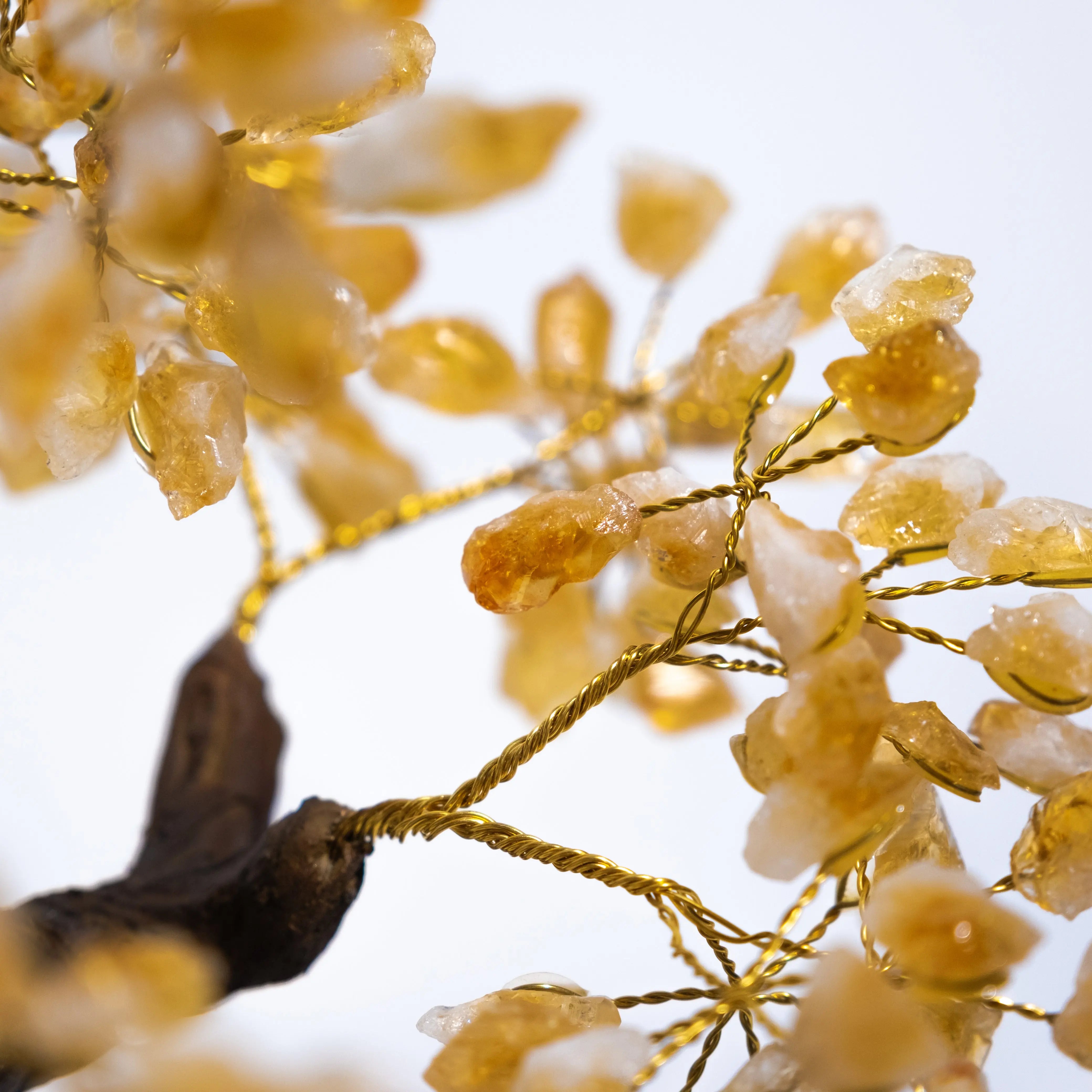 Close-up of a handcrafted Citrine Crystal Bonsai Tree with genuine citrine gemstones, symbolizing prosperity and positive energy.