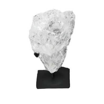 Rough Lemurian Clear Quartz on metal stand, enhances spiritual energy, purifies negative vibes, perfect luxury decor by Sylvia Crystals.
