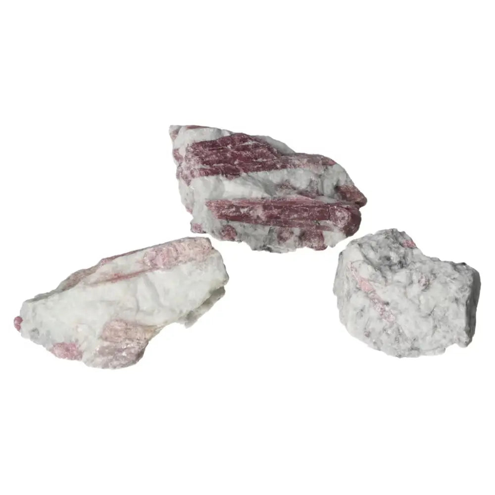 Rough pink tourmaline druze stones, symbolizing feminine energy and harmony, promoting peace and gratitude