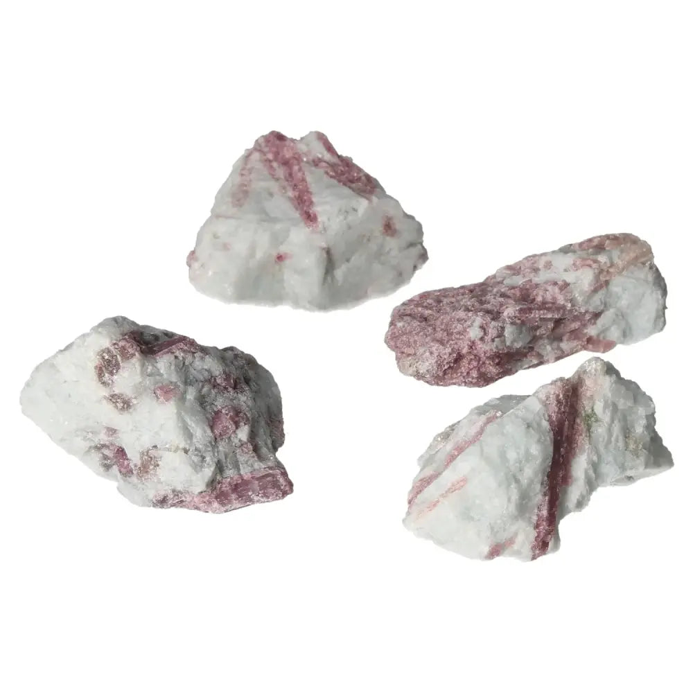Rough Pink Tourmaline druzy stones symbolizing gentle feminine energy and promoting peace and inner balance.