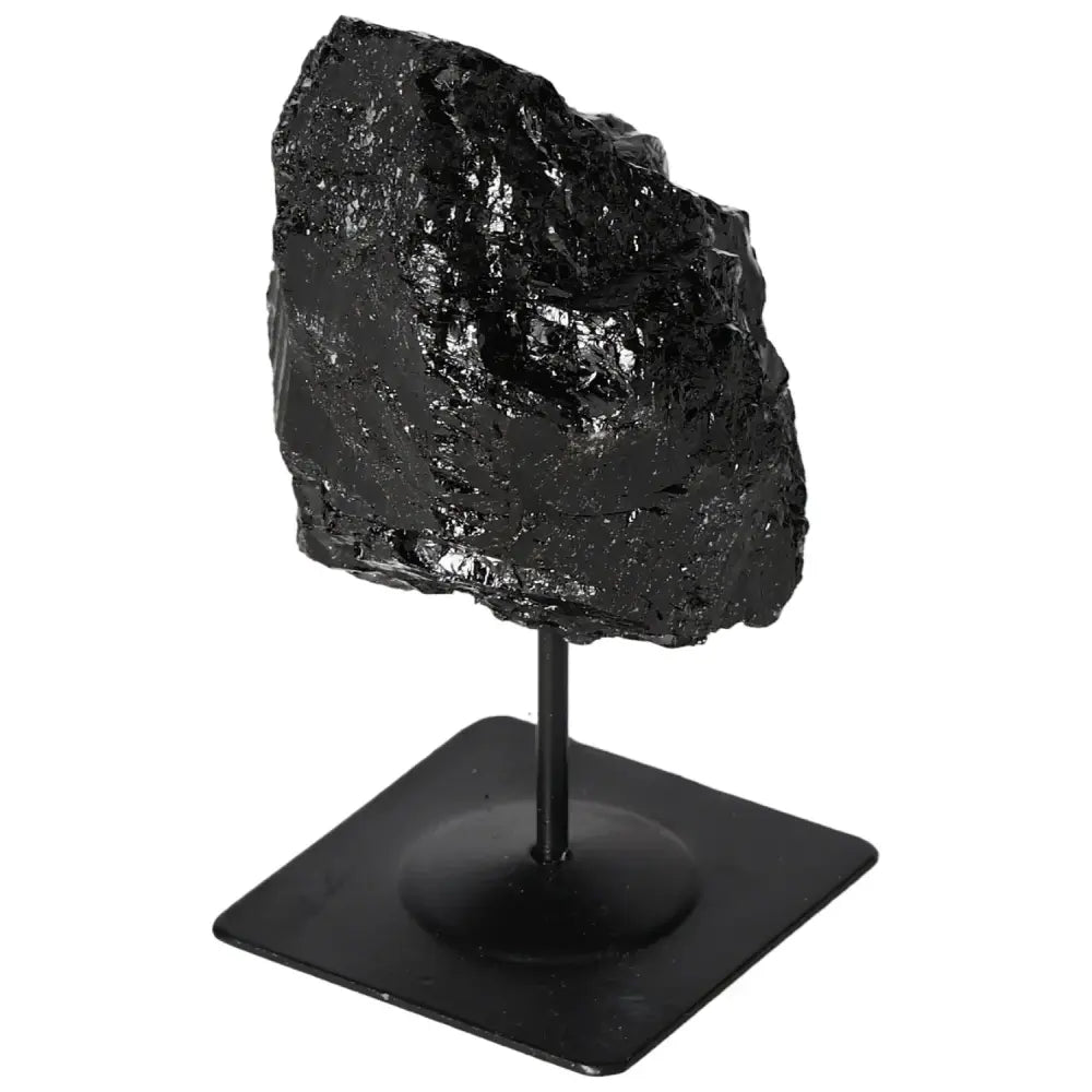 Rough Tourmaline crystal on a metal stand, showcasing prismatic beauty and elegance, ideal for luxury home or office decor.