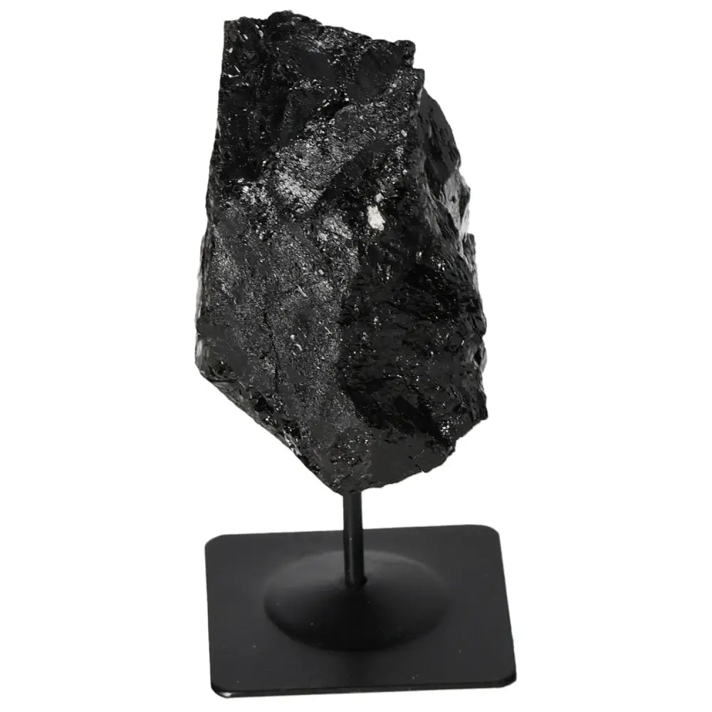 Rough tourmaline crystal on sleek metal stand, premium Sylvia Crystals product, elegant design for home decor.