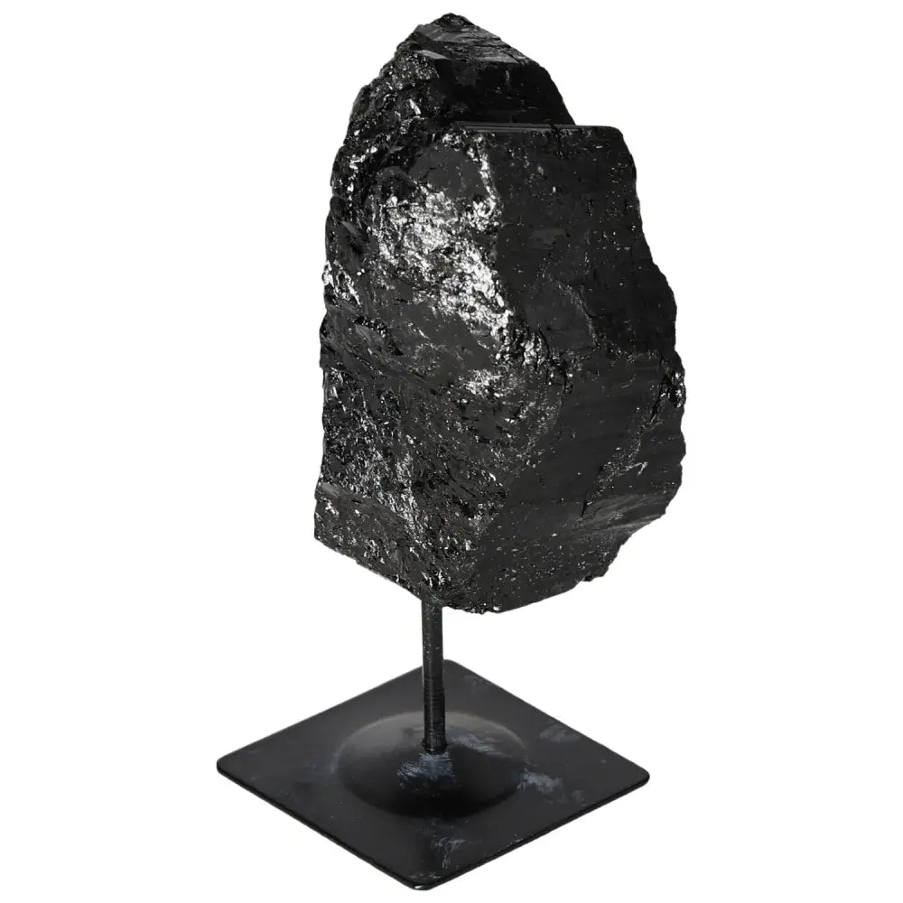 Elegant rough tourmaline crystal on a metal stand from Sylvia Crystals, showcasing natural beauty and premium quality.