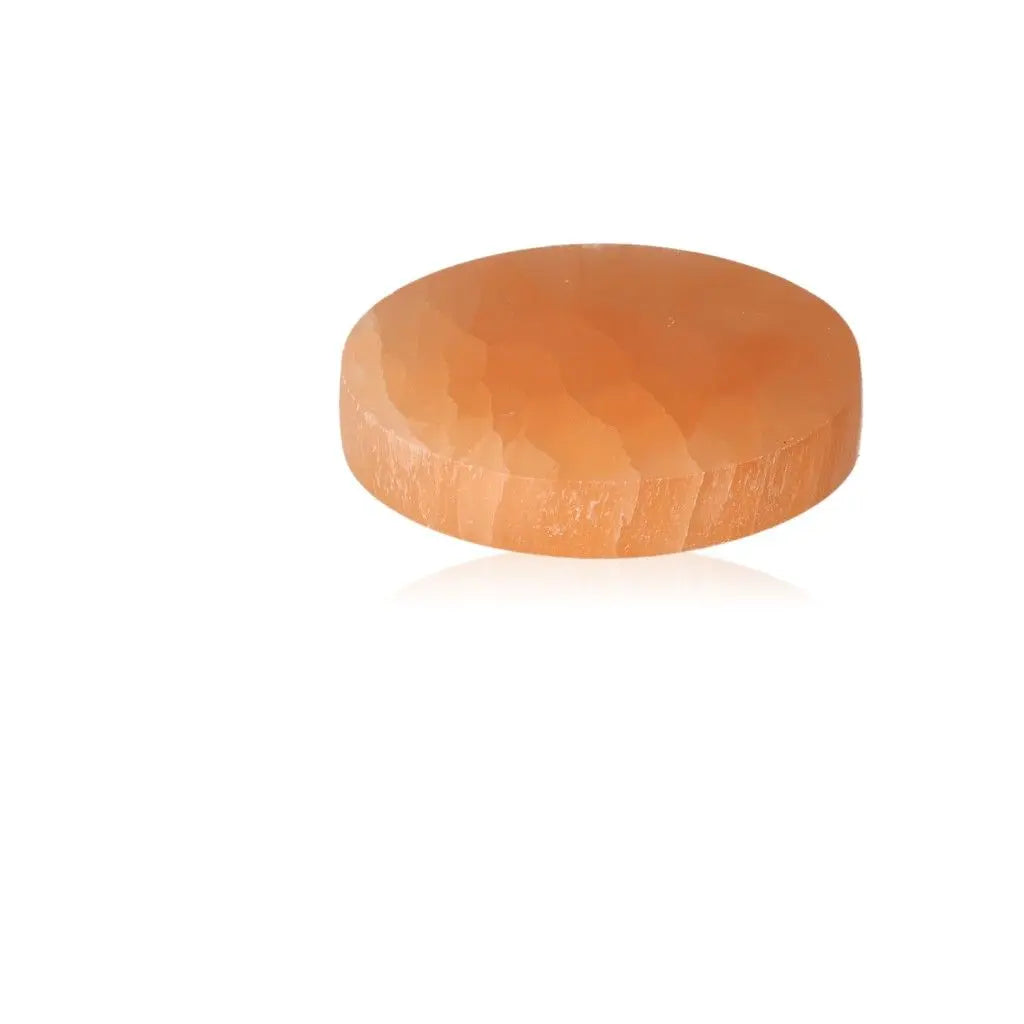 Selenite Orange Disk by Sylvia Crystals for purity and spiritual growth, ethically sourced for mindful living.