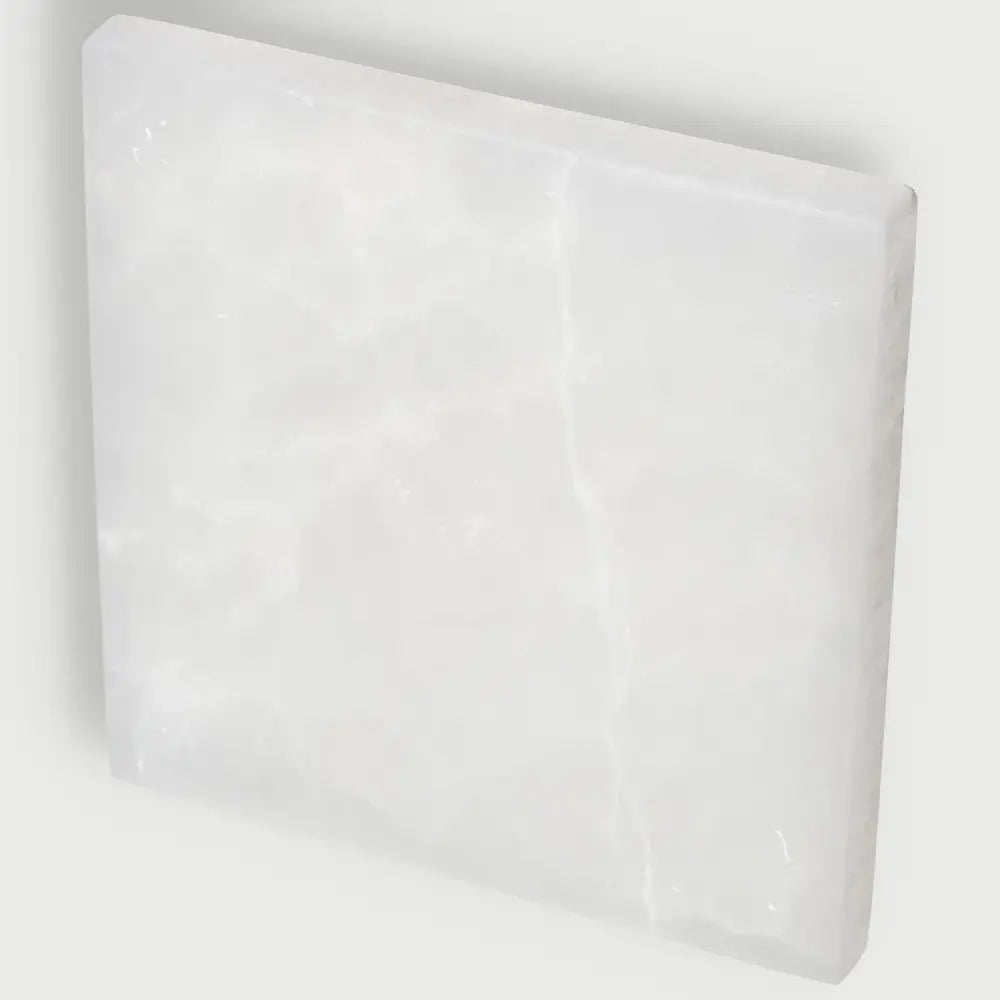 Selenite Plate 14cm by Sylvia Crystals, ethically sourced for mindfulness and spiritual growth.