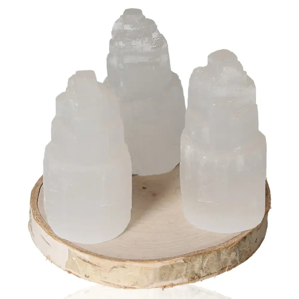 Set of three 6cm selenite towers with a smooth satin finish, perfect for creating a serene and balanced atmosphere in any space.