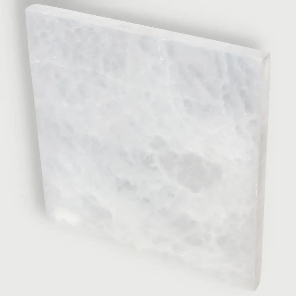 20cm selenite plate by Sylvia Crystals for spiritual growth and purity, ethically sourced and premium quality for mindful living.