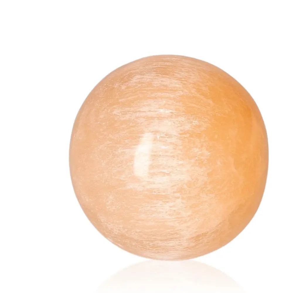8cm Selenite sphere from Sylvia Crystals, promoting purity and power; perfect for mindful living and spiritual growth.