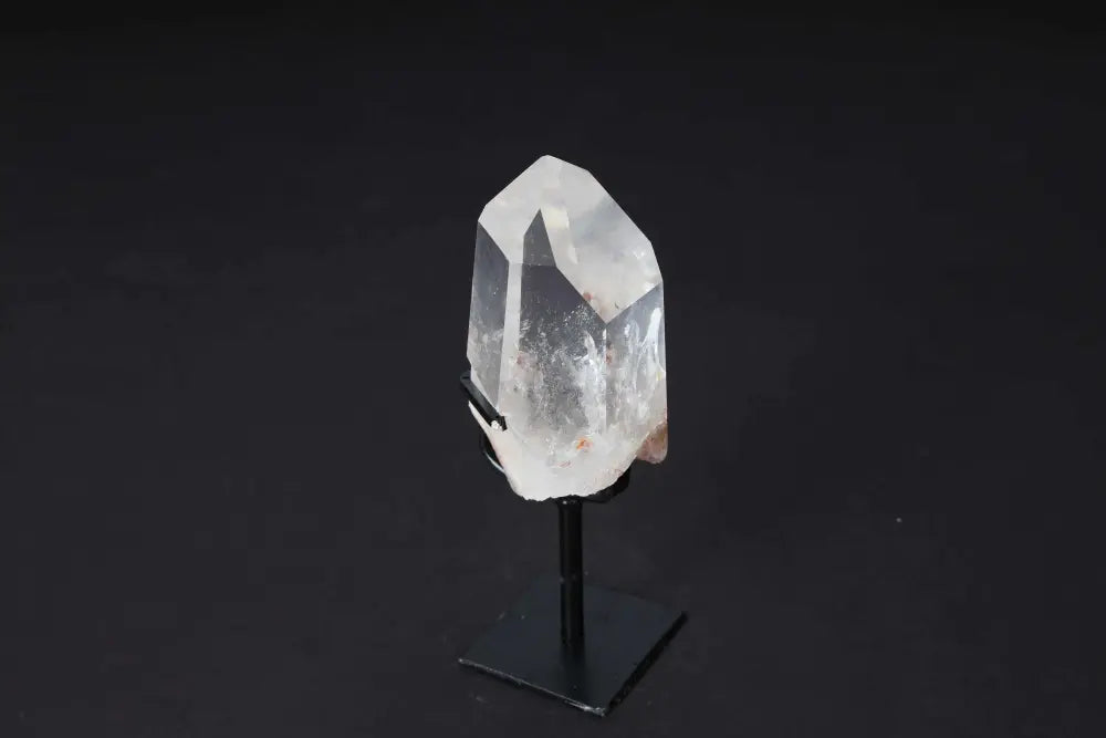 Semi Polished Clear Quartz Point on Stand, enhances clarity and energy. Ideal for meditation and energy work, elegant home decor piece.