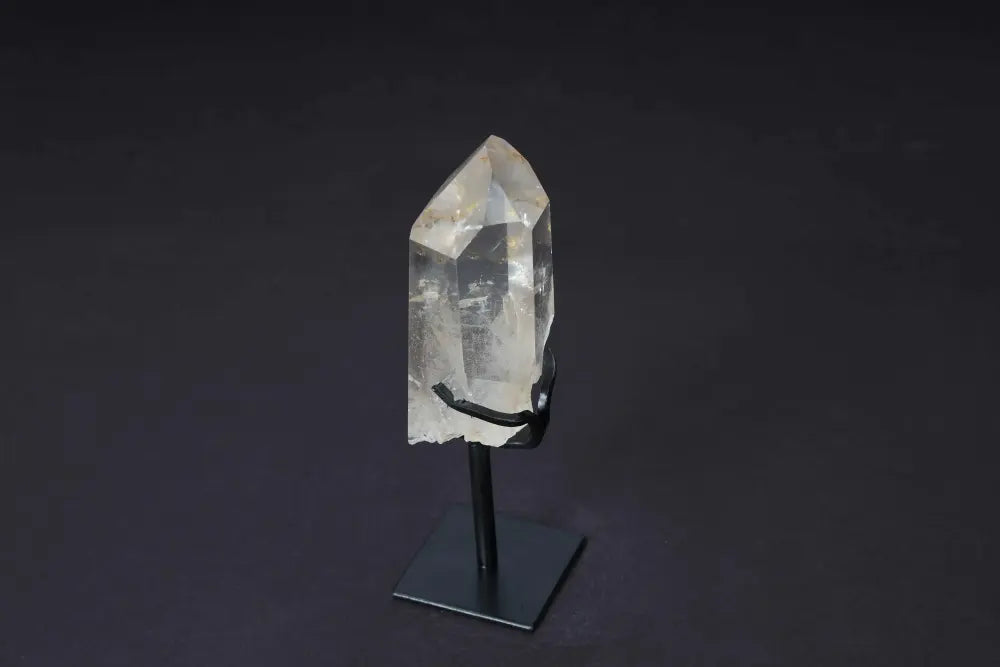 Semi-Polished Smoky Quartz Point on Stand, showcasing natural raw edges and polished faces, for grounding and decor elegance.