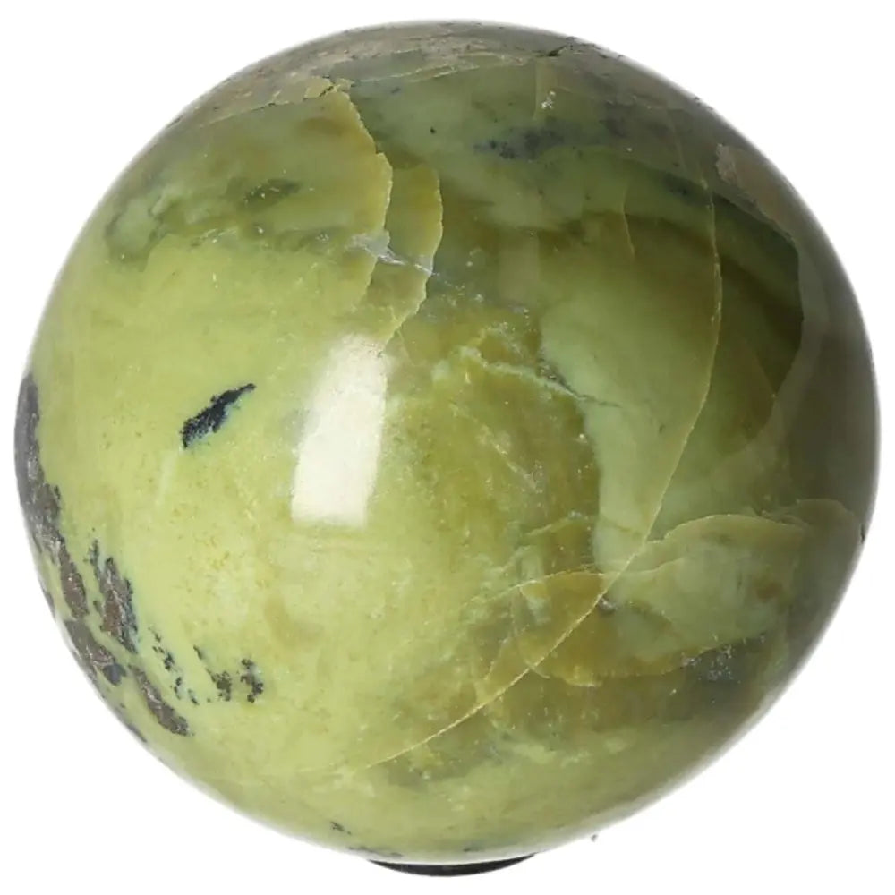 Green serpentine sphere for spiritual healing and meditation, enhances emotional balance and heart chakra activation.