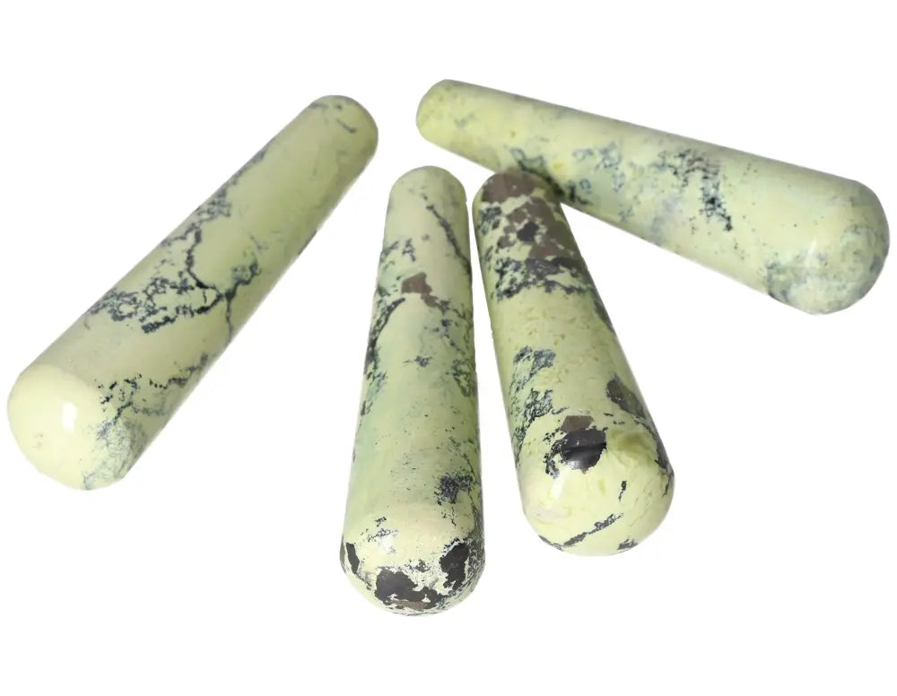 Serpentine wands for spiritual healing and meditation, enhancing heart chakra and emotional balance.