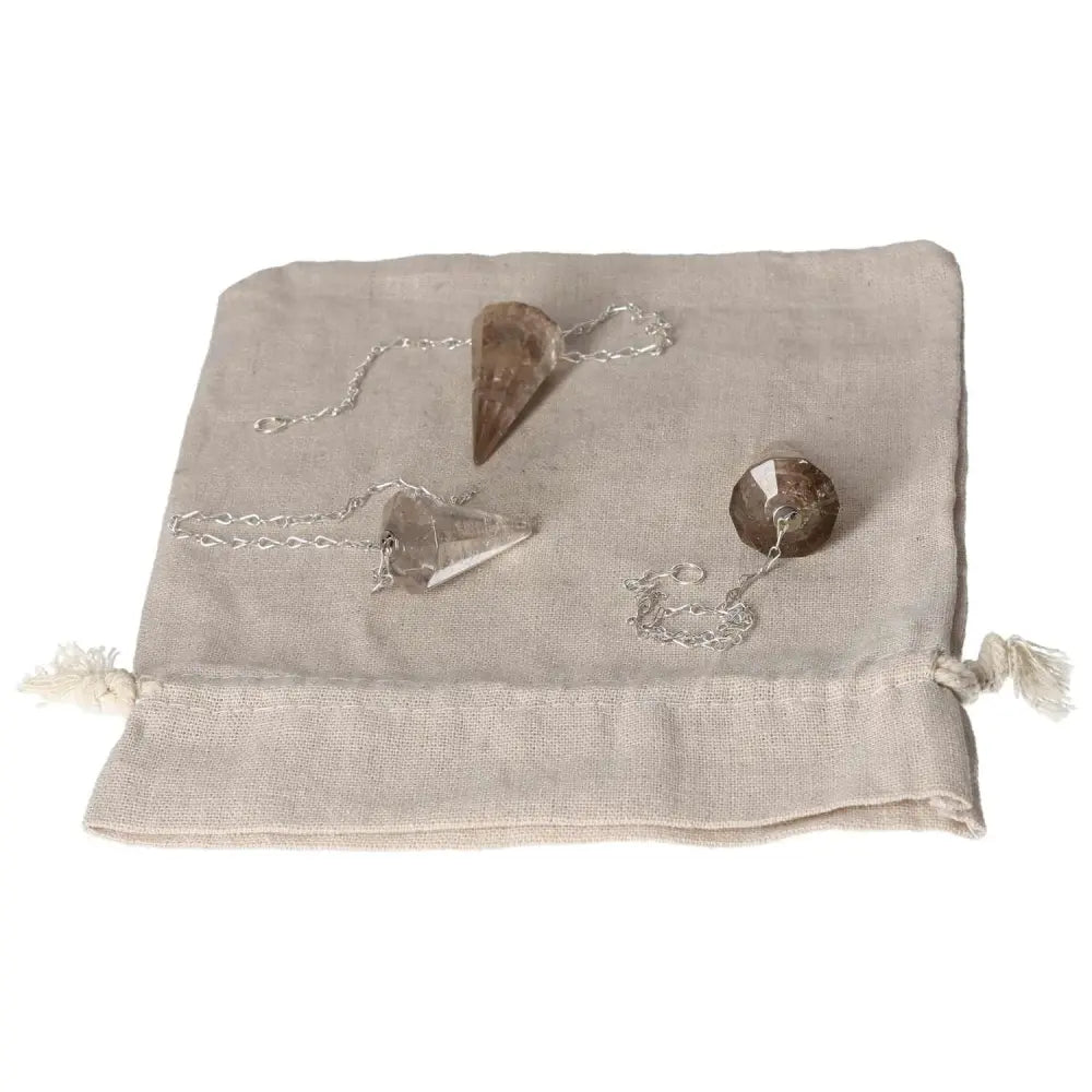 Smoky Quartz Pendulum Set on Linen Pouch, ideal for decision-making and grounding in business and professional settings.