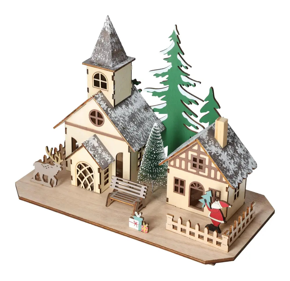 Table Deco Village House LED 27 cm by Sylvia Crystals, featuring a charming miniature scene with snow-topped houses and trees.