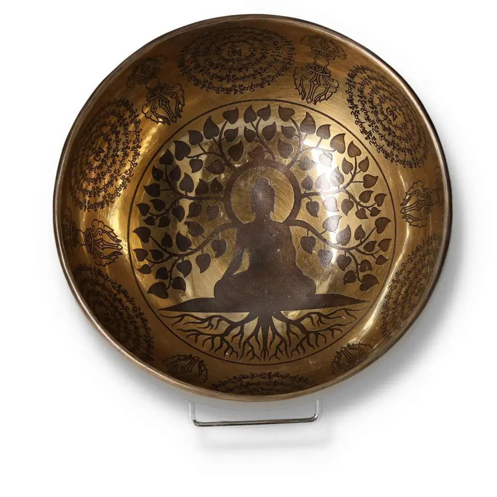 Tibetan Healing Bowl with Bodhi Tree and Buddha engraving, 16 cm in diameter, featuring intricate designs for meditation and relaxation.