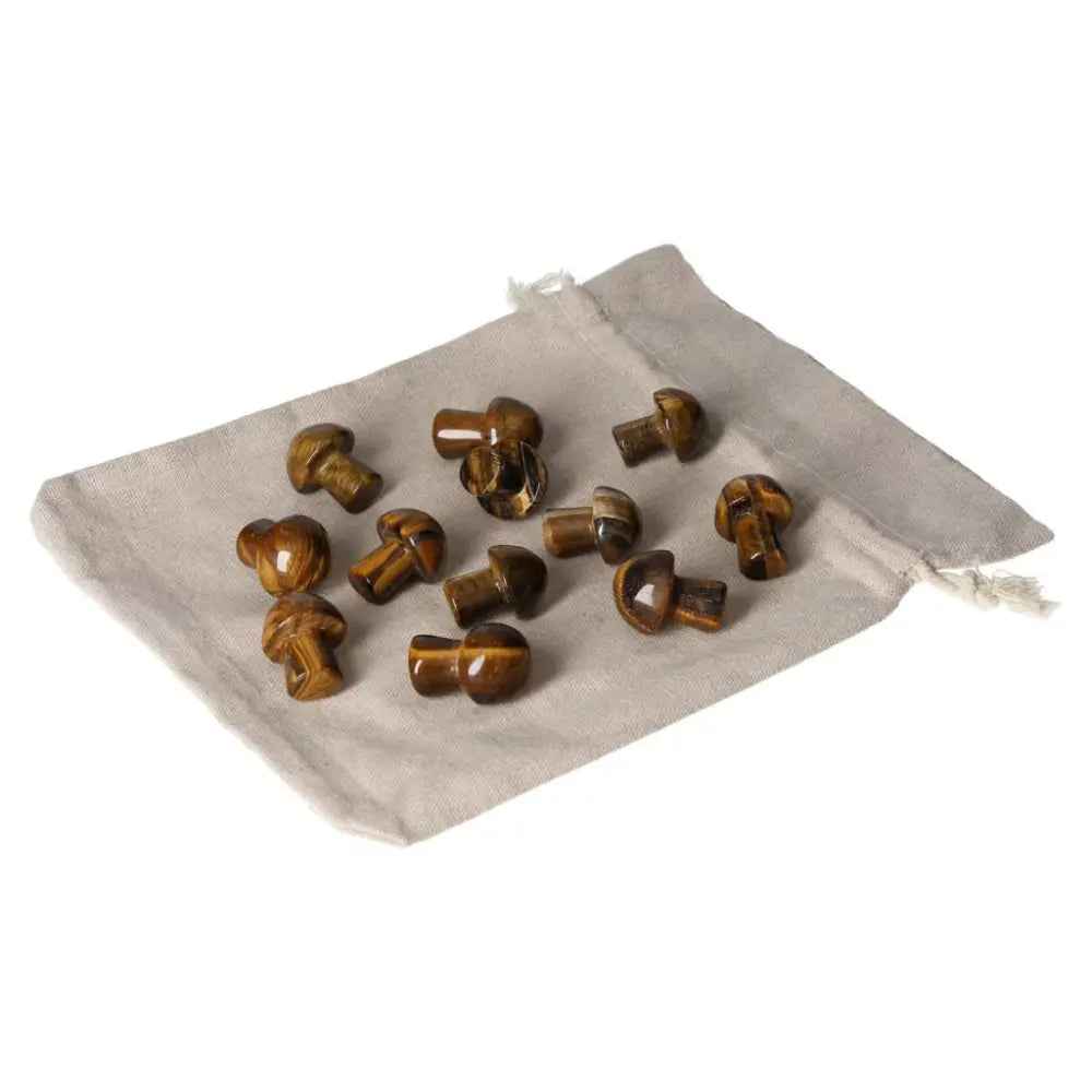 Tiger's Eye small mushroom stones on beige cloth bag, enhancing mental clarity and stability, perfect for focus and wealth management.