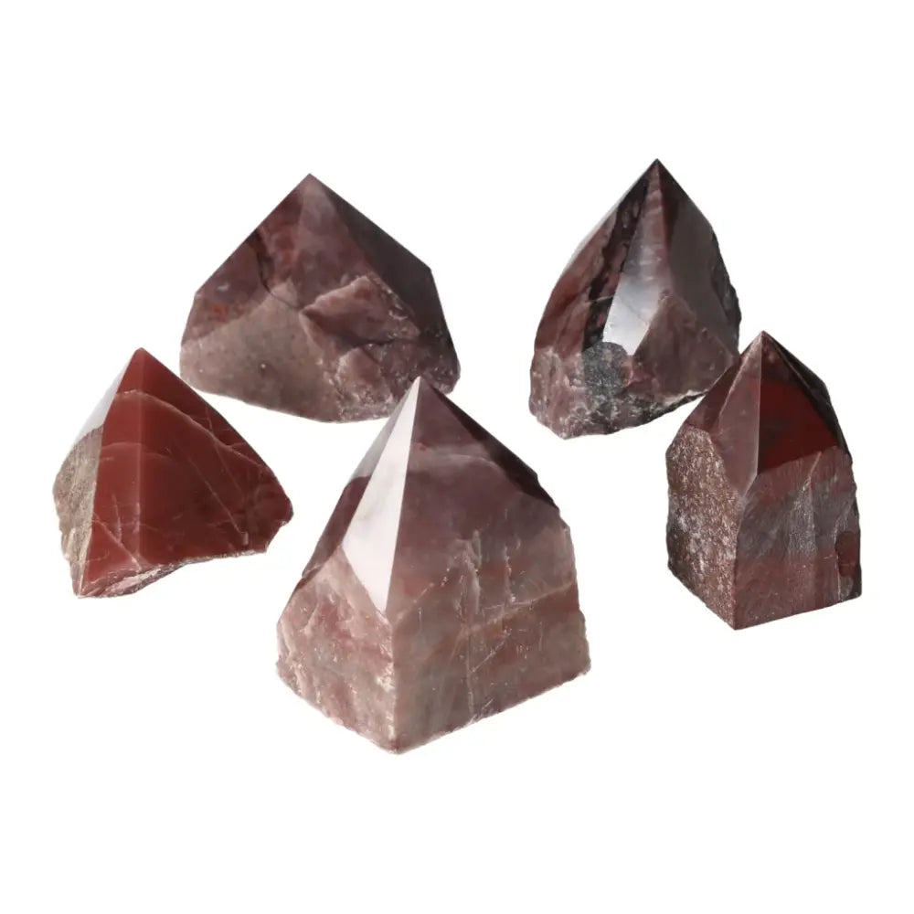 Top Polished Point Guava Quartz collection with unique pink hue from Sylvia Crystals, embodying luxury and spiritual wellness.