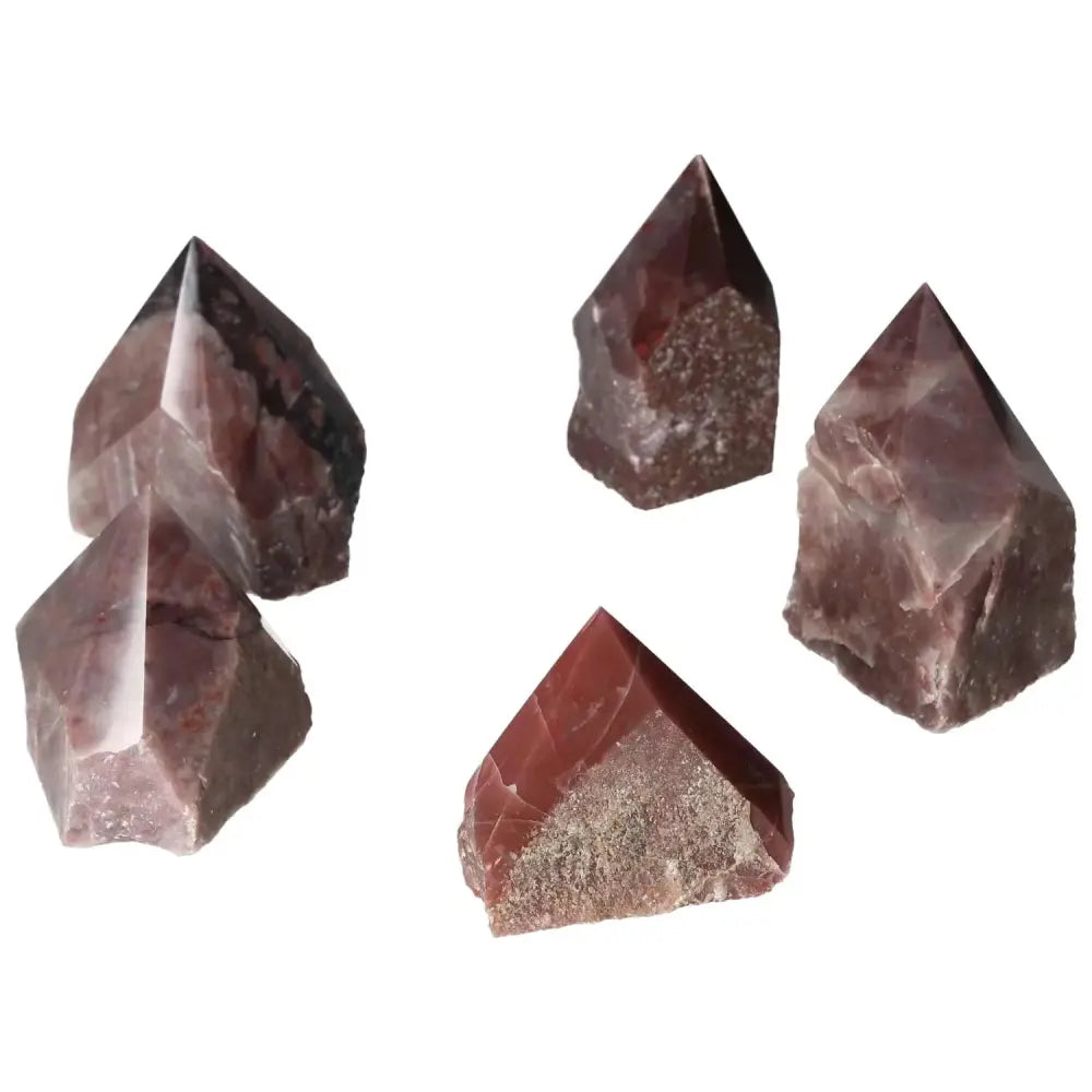 Top Polished Point Guava Quartz M crystals with unique pink hue, enhancing beauty and spiritual wellness by Sylvia Crystals.