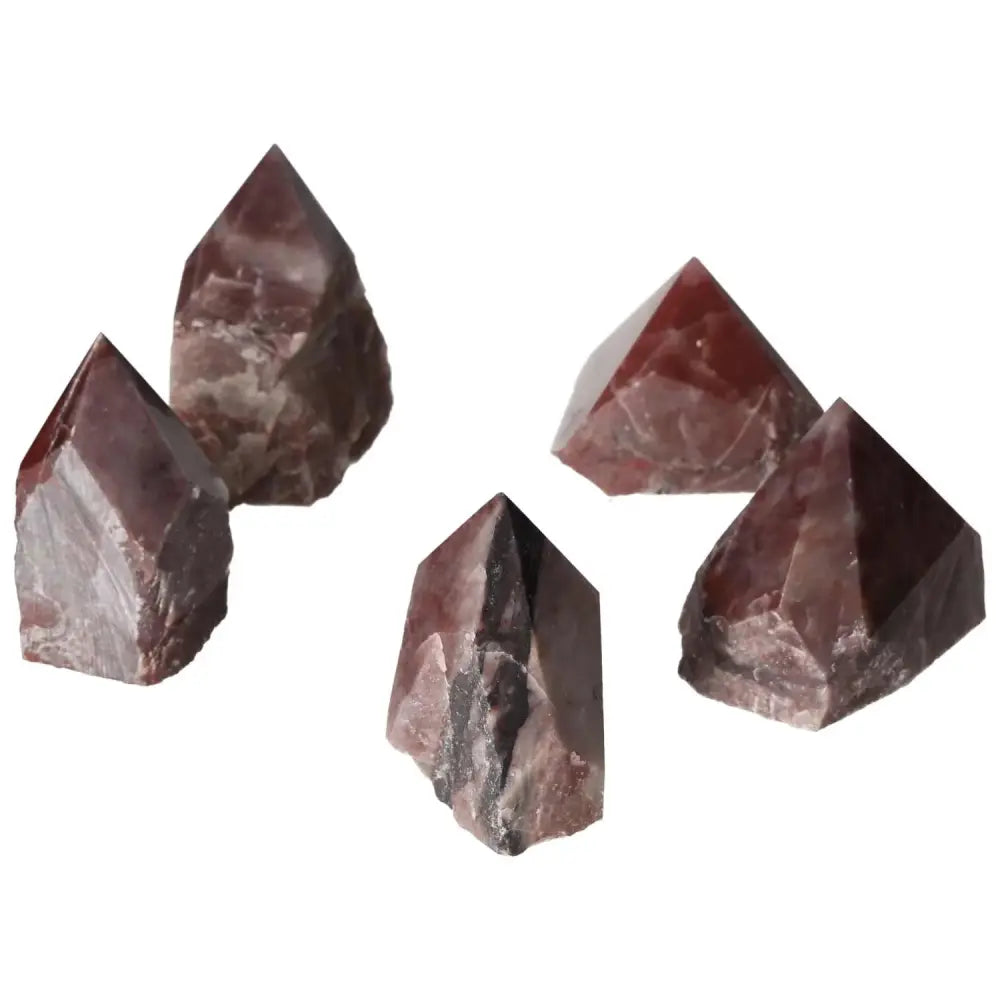 Top Polished Point Guava Quartz M from Sylvia Crystals, showcasing its unique pink hue and luxury appeal.