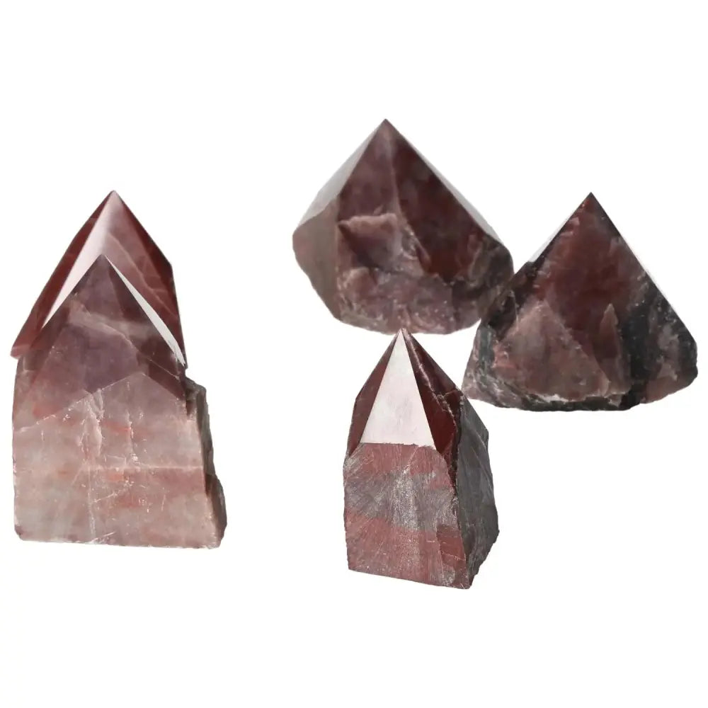 Top Polished Point Guava Quartz M crystals, premium handpicked stones with unique pink hue, embodying luxury and spiritual wellness.