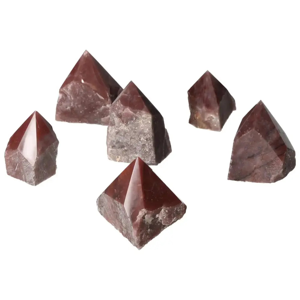 Top Polished Point Guava Quartz S by Sylvia Crystals showcasing a radiant guava hue and elegant spiritual design.