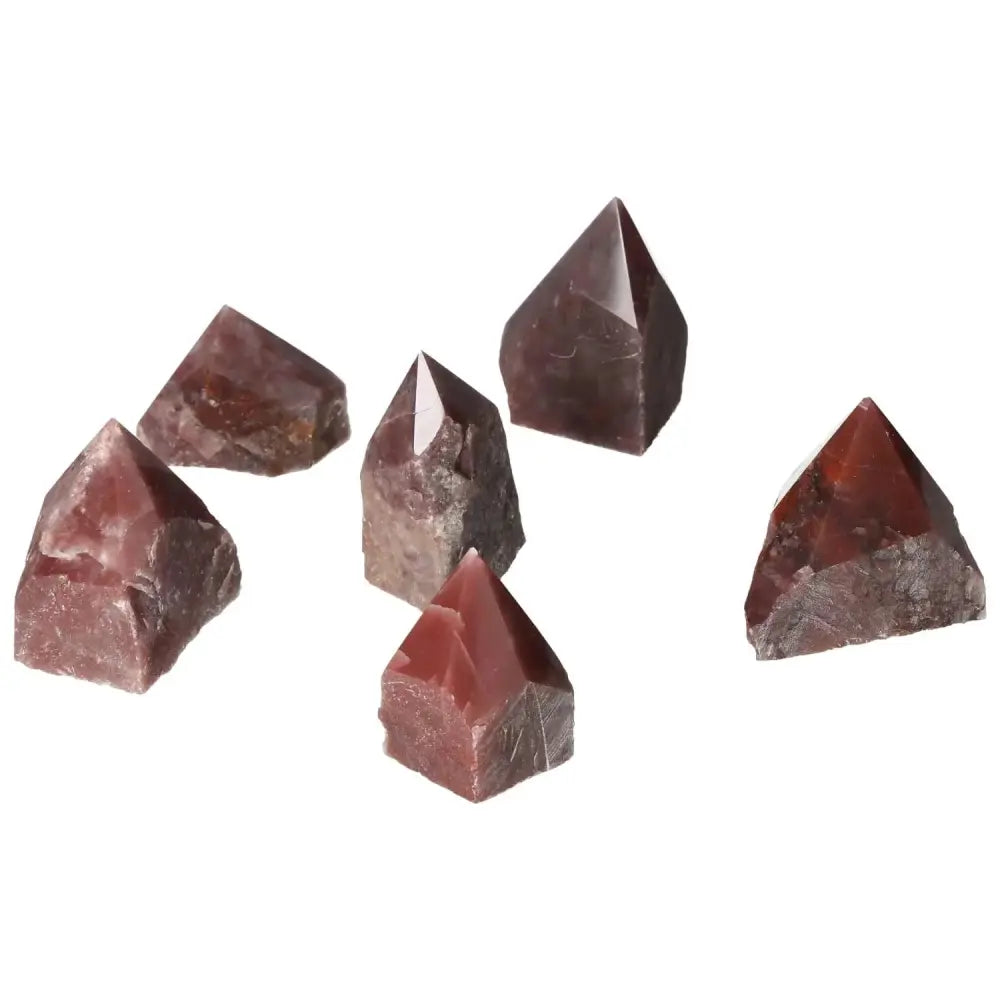 Top Polished Point Guava Quartz S from Sylvia Crystals, showcasing six exquisite guava-hued quartz points with spiritual benefits.