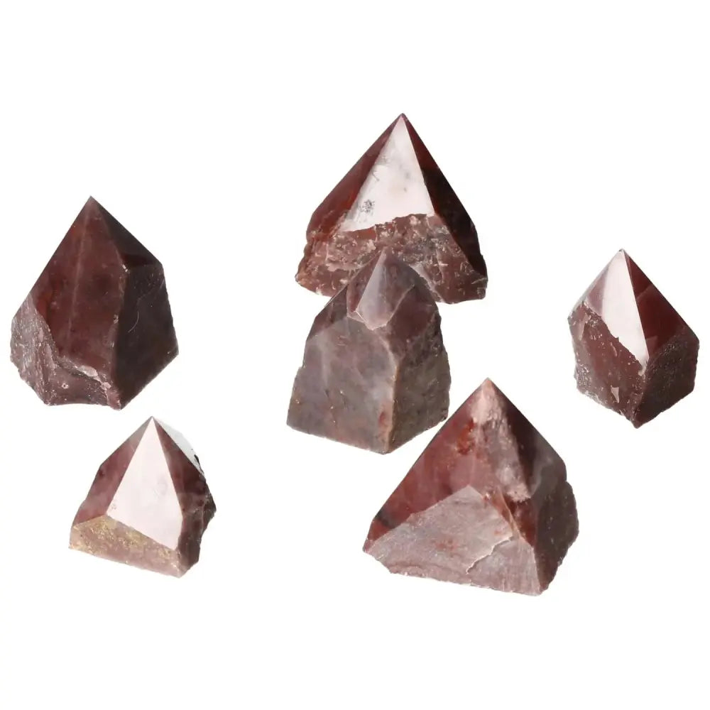 Top Polished Point Guava Quartz crystals in various sizes, featuring a gentle guava hue and spiritual benefits, from Sylvia Crystals.