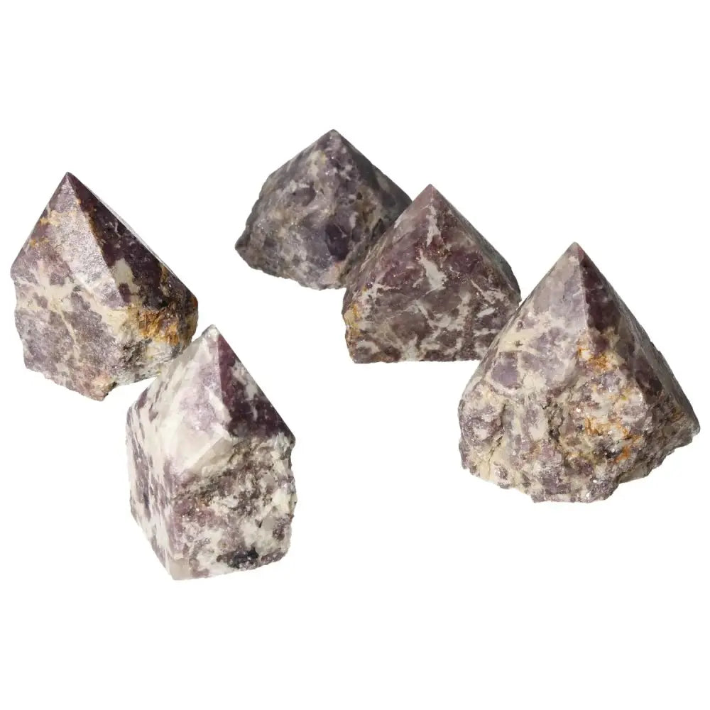 Top Polished Point Lepidolite gemstones showcasing their calming properties and exquisite beauty from Sylvia Crystals.