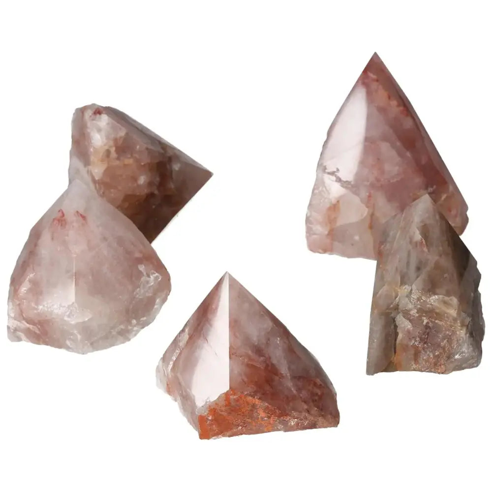 Pink Hematoide crystals set, showcasing polished points with natural pink hues, perfect for enhancing serenity and positive energy.