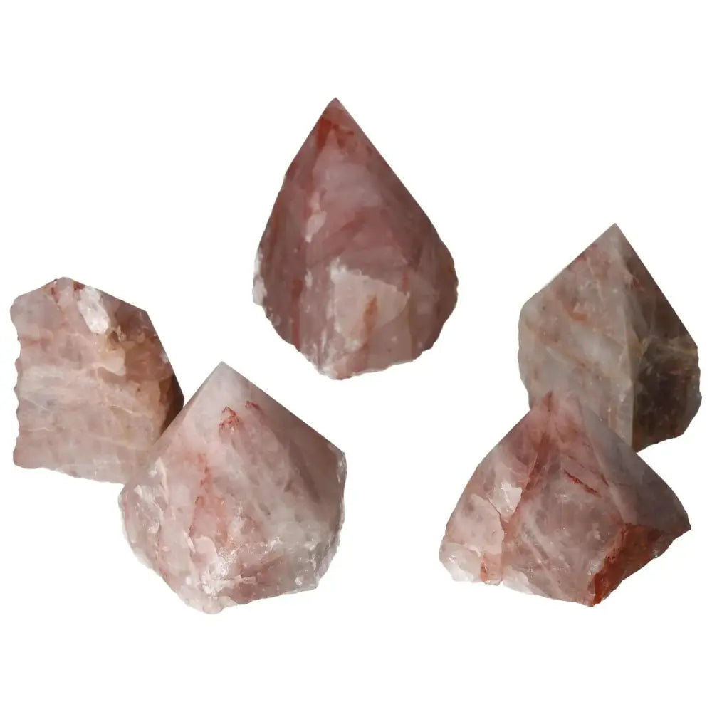 Top Polished Point Pink Hematoide crystals showcasing delicate pink hues, ideal for enhancing serenity and positive energy.