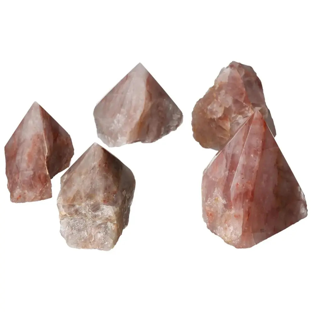 Top Polished Point Pink Hematoide Crystals from Sylvia Crystals, showcasing natural beauty and pink hues for positive energy.
