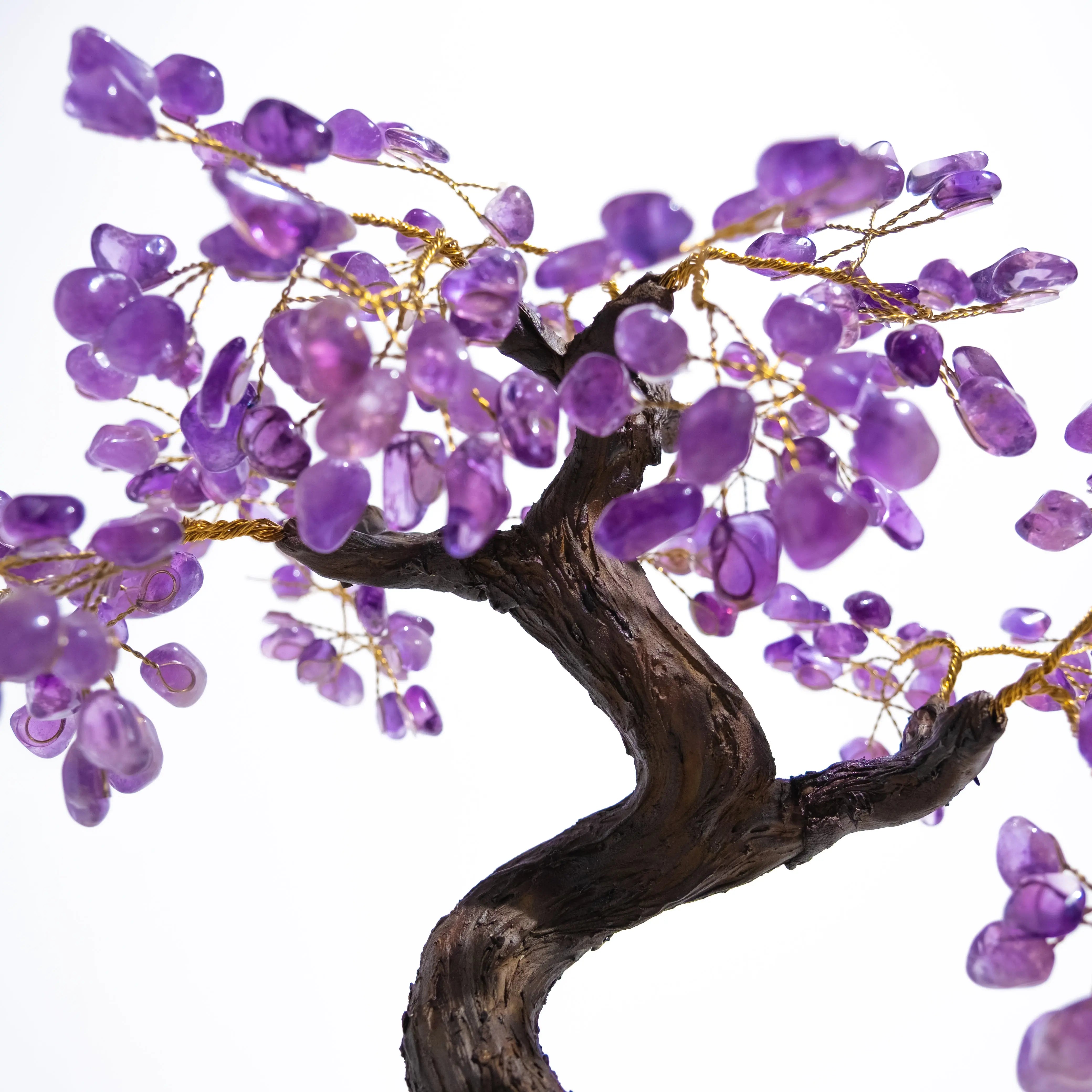 Tumbled Amethyst Crystal Bonsai Tree with gemstone leaves promoting tranquility and spiritual harmony.