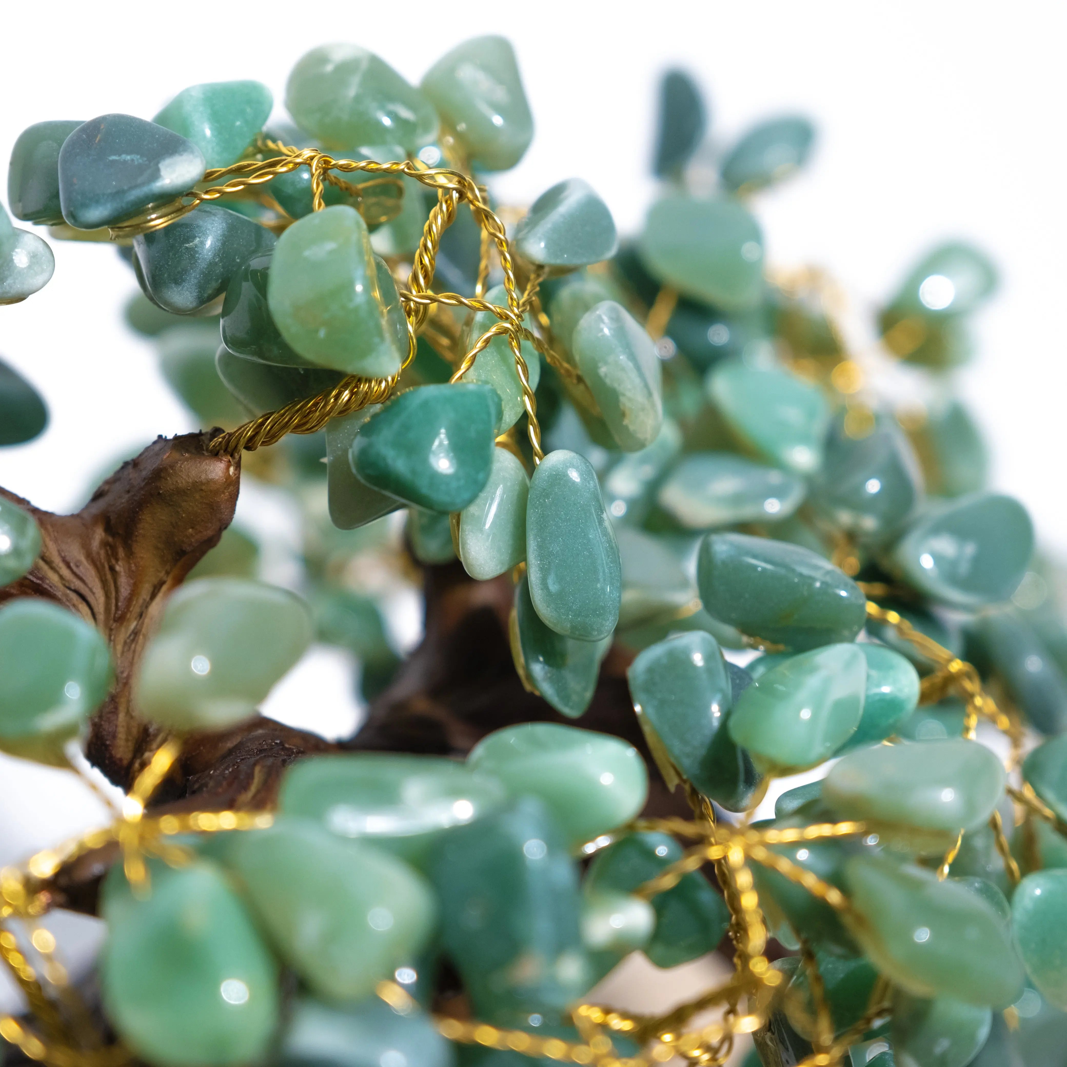 Close-up of handcrafted Tumbled Aventurine Crystal Bonsai Tree showcasing green aventurine stones promoting prosperity and harmony.