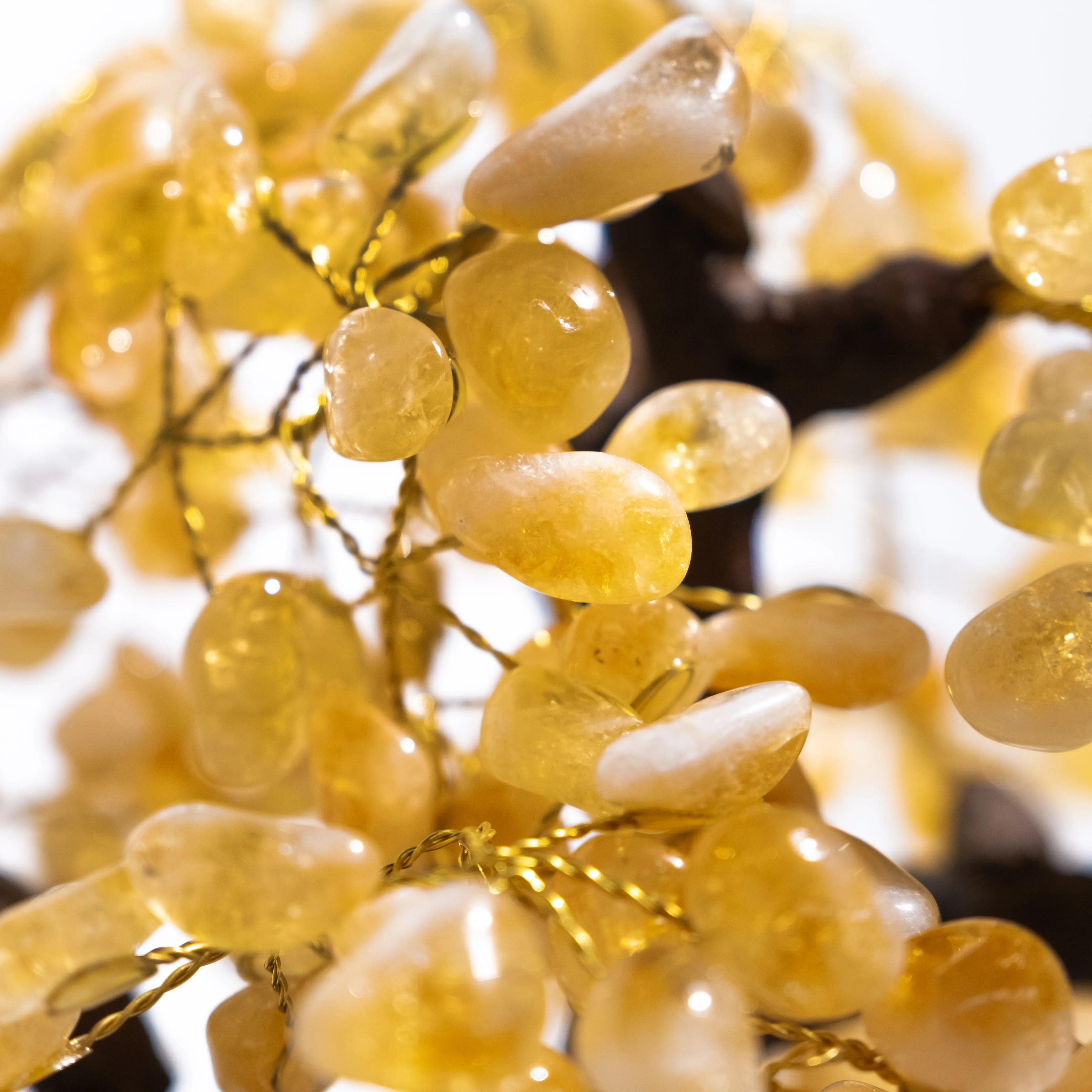 Close-up of handcrafted Tumbled Citrine Crystal Tree featuring citrine gemstones for prosperity, abundance, and positive energy.