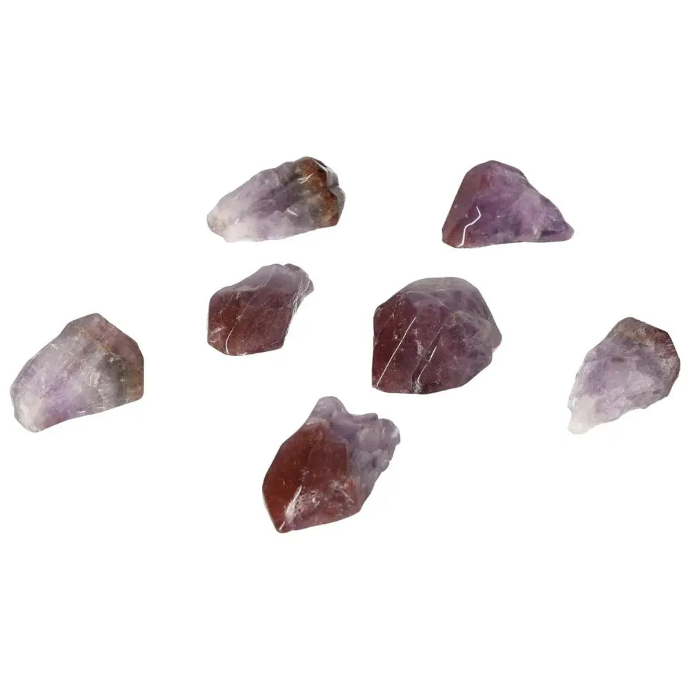 Tumbled Point Amethyst M crystals from Sylvia Crystals, known for stress reduction and energy boosting properties.