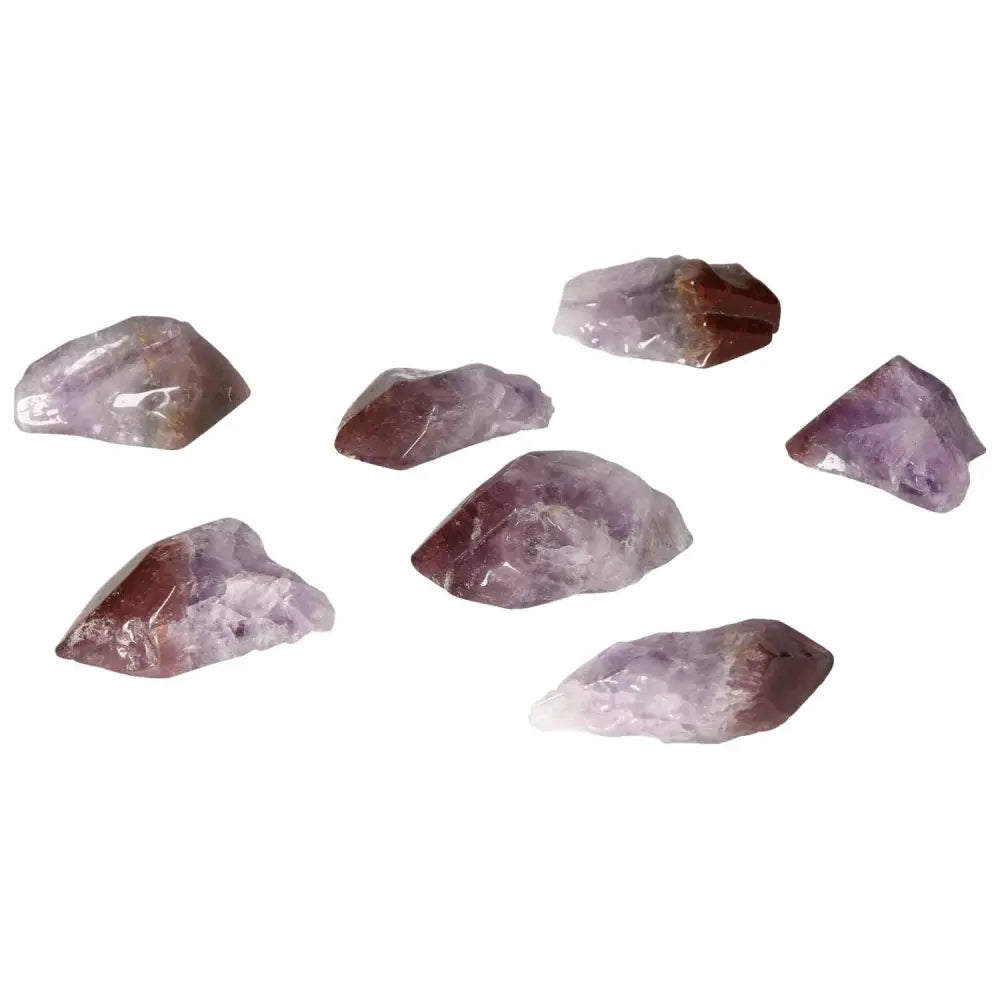Tumbled Point Amethyst M crystals from Sylvia Crystals collection, known for reducing stress and boosting energy and concentration.