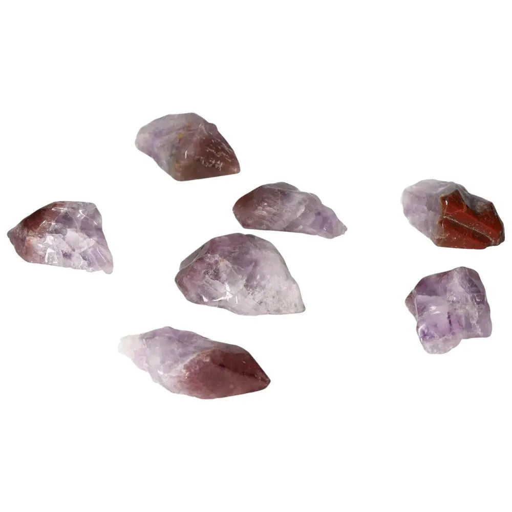 Premium Tumbled Point Amethyst M crystals from Sylvia Crystals, known for reducing stress, boosting energy, and enhancing concentration.