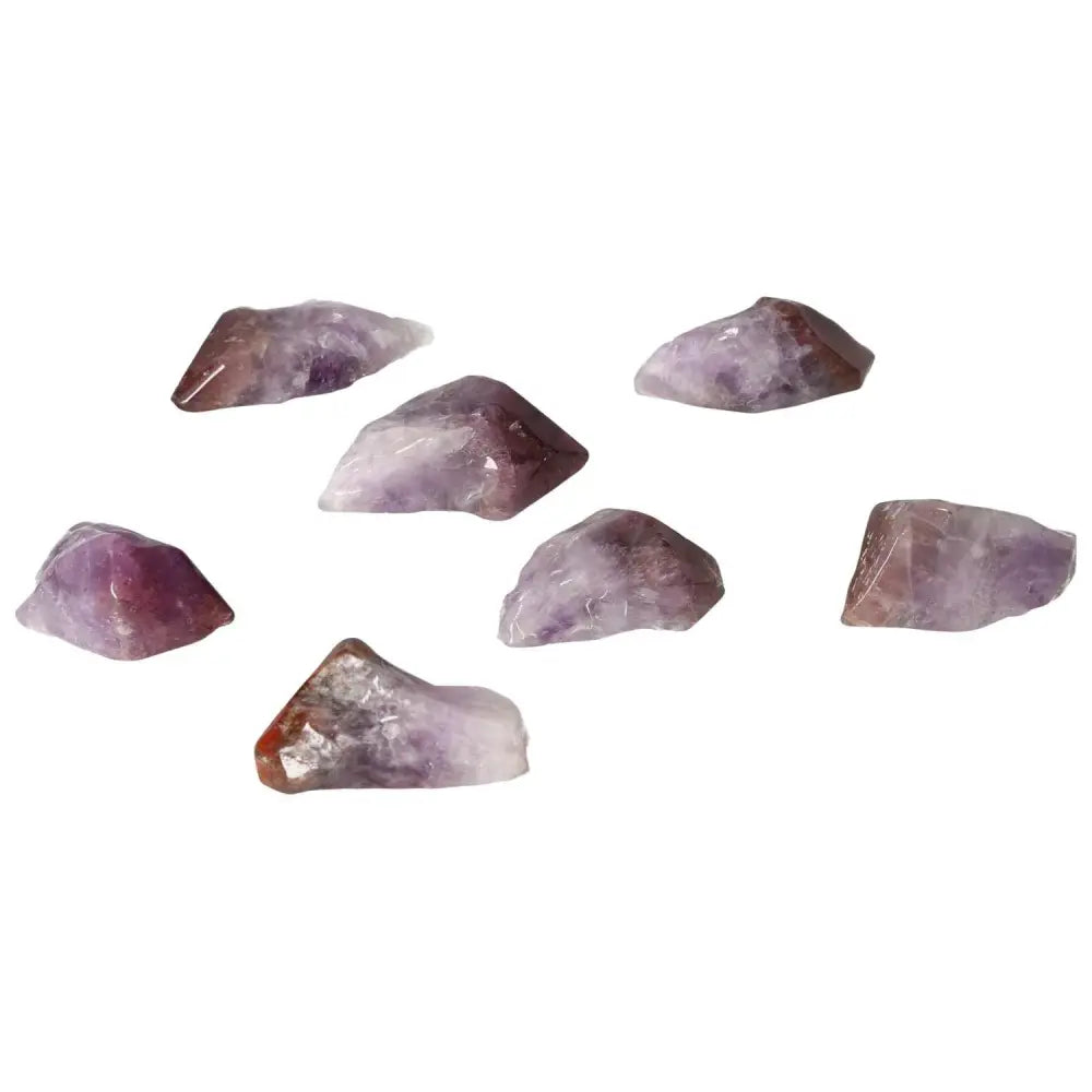 Tumbled Point Amethyst M crystals from Sylvia Crystals, known for reducing stress, boosting energy, and enhancing concentration.