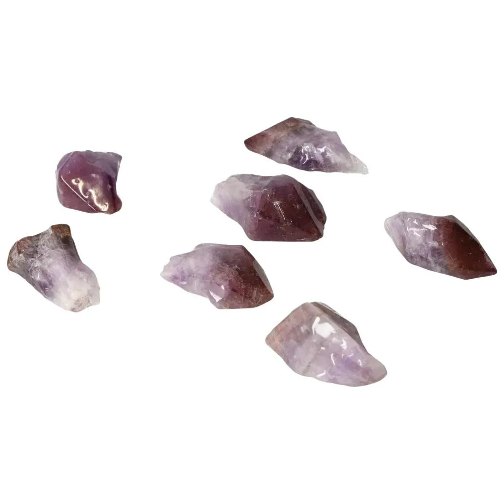 Set of Tumbled Point Amethyst M crystals showcasing spiritual elegance, stress relief, and energy boost from Sylvia Crystals collection.